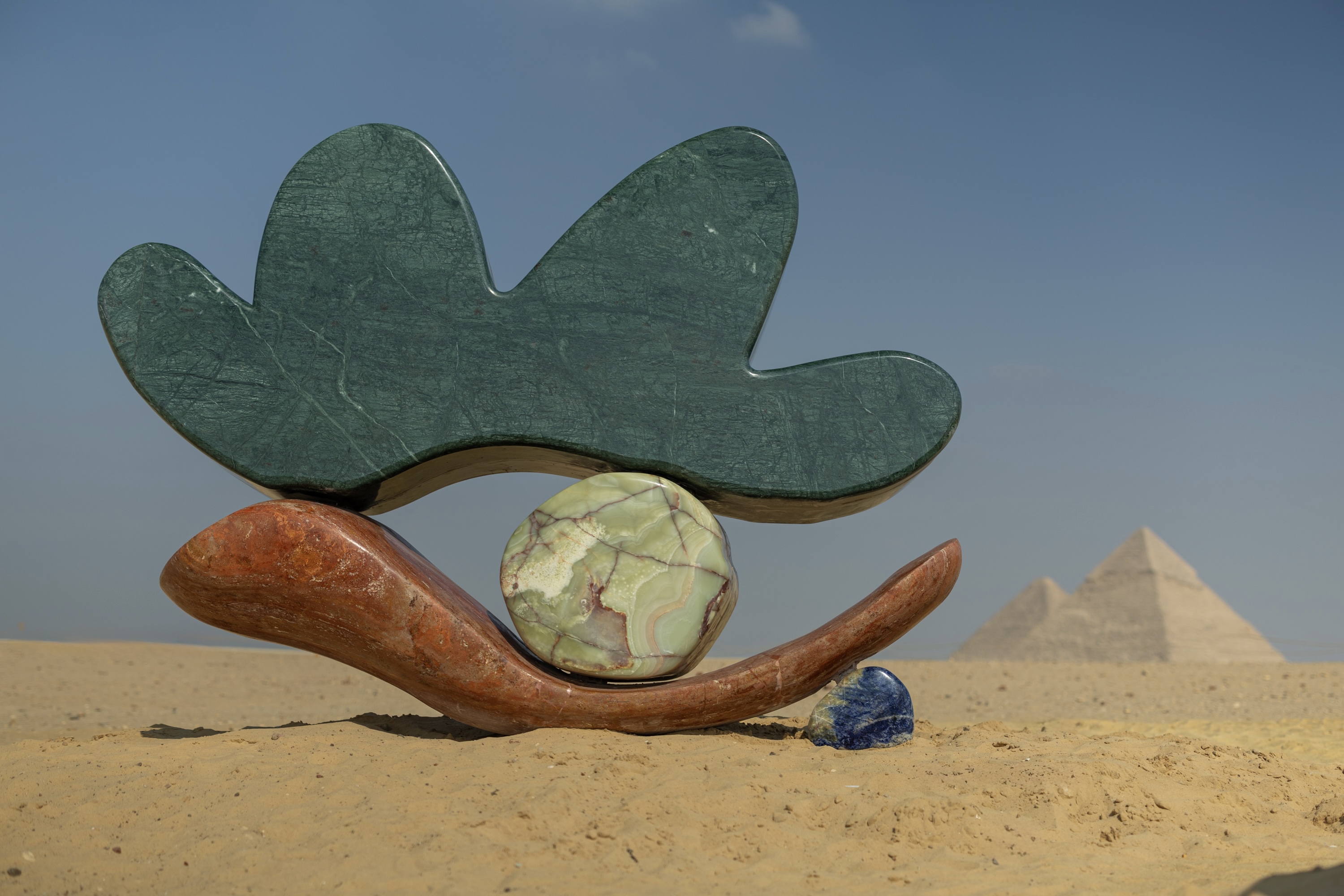 Giza Pyramids with colourful marble installation by Studio Proba