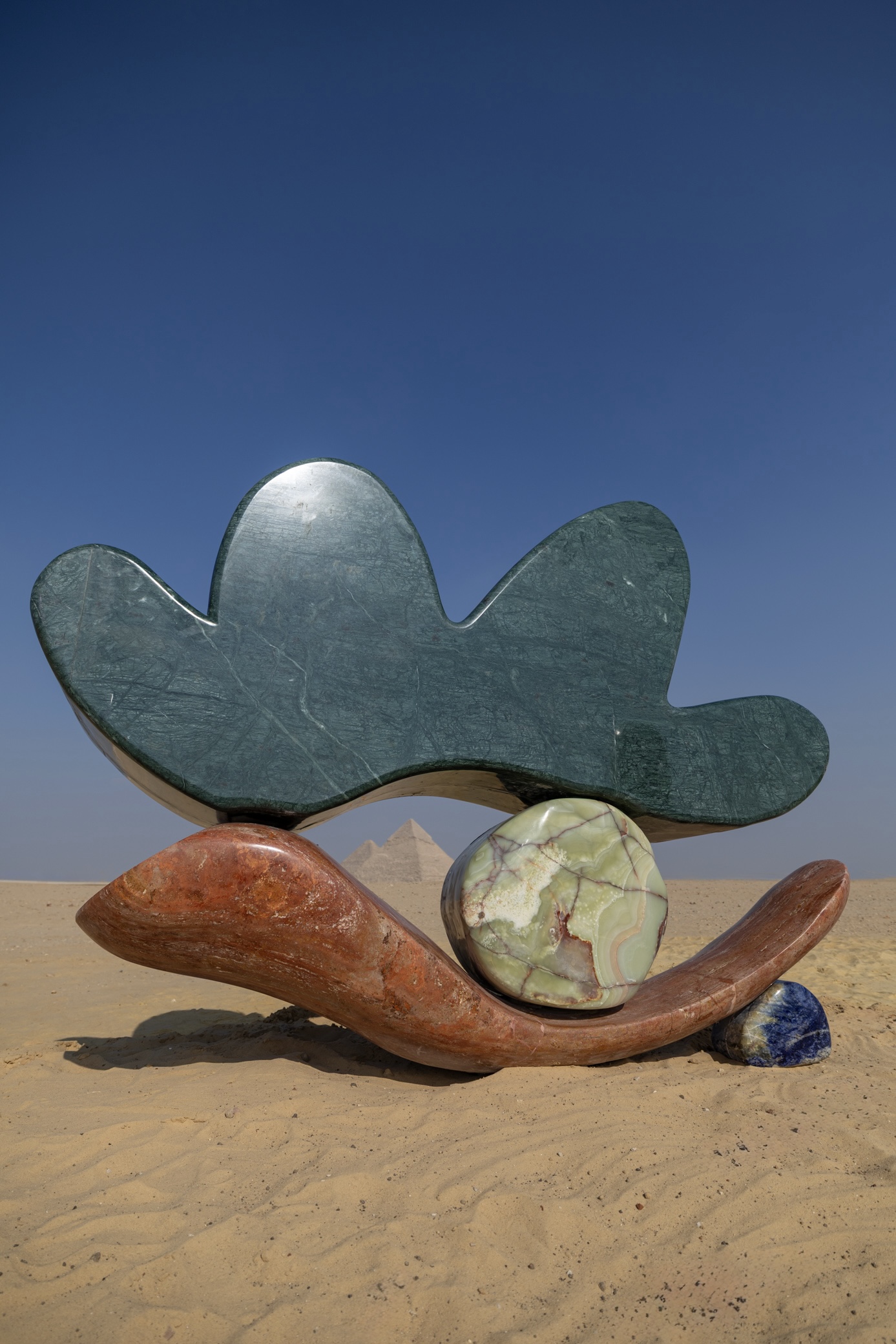 Giza Pyramids with colourful marble installation by Studio Proba