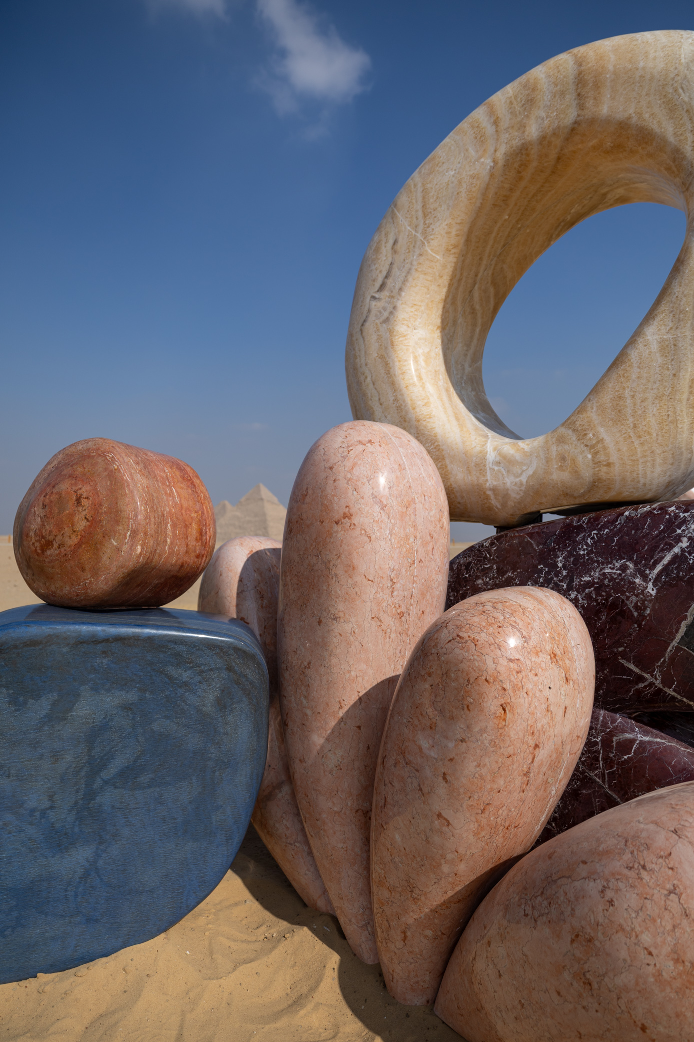 Giza Pyramids with colourful marble installation by Studio Proba